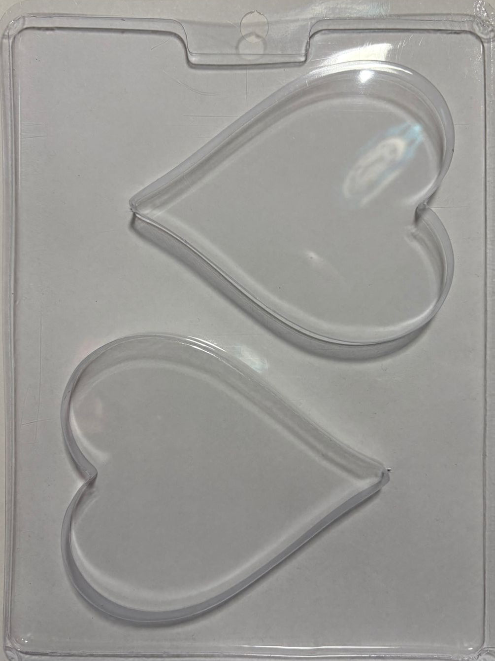 Molde plástico transparente 2 corazones planos 10x11 cm 1 cm profundidad